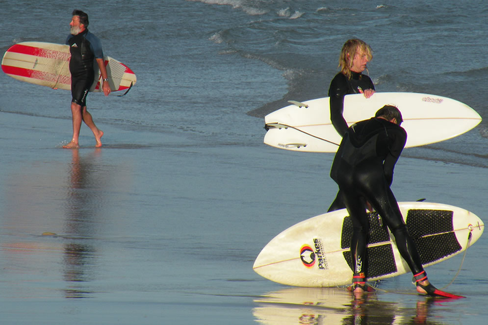 Surfers at Tallow Beach Byron Bay